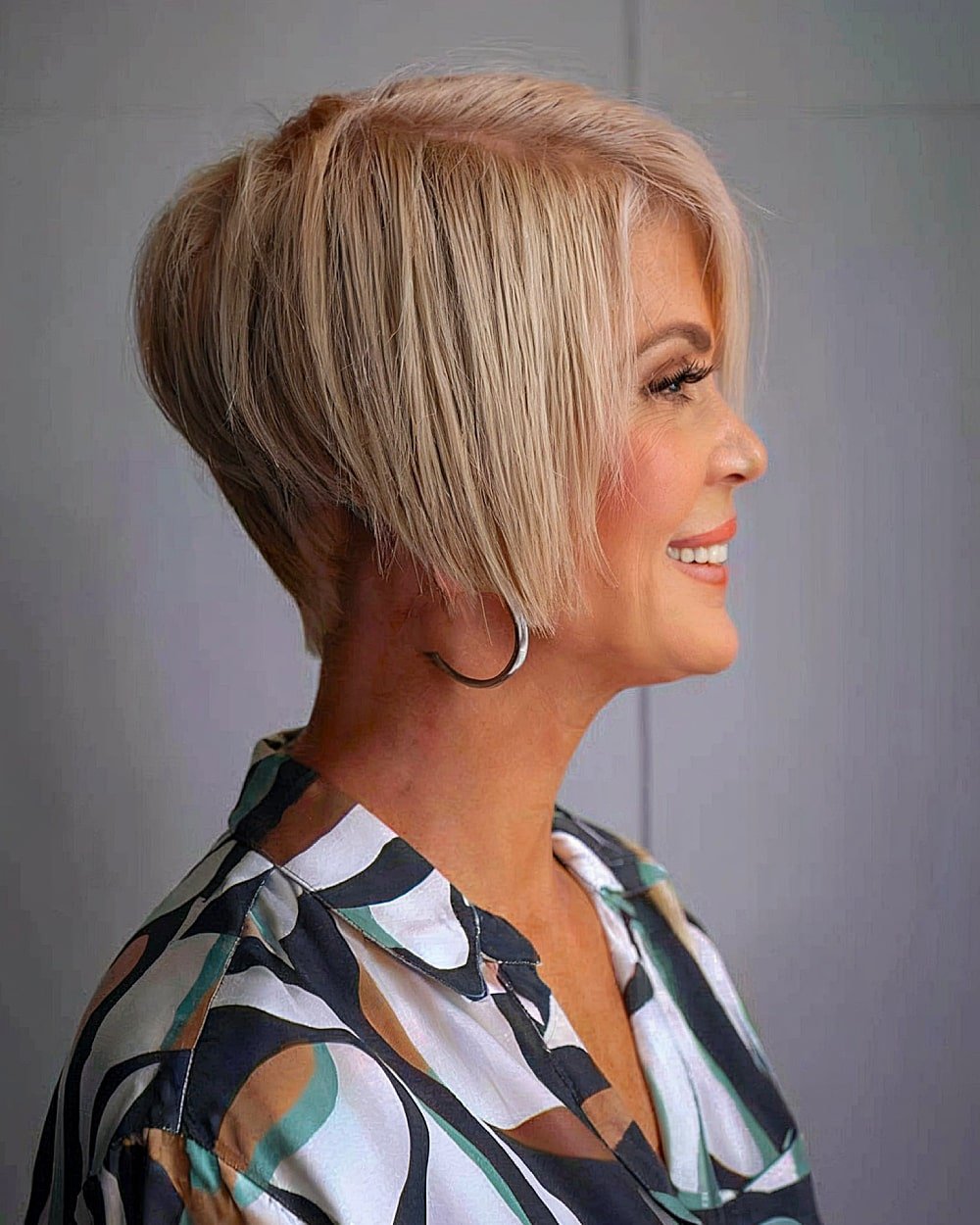 Short Sharply Angled Bob for 50-year-old Women with Thin Hair
