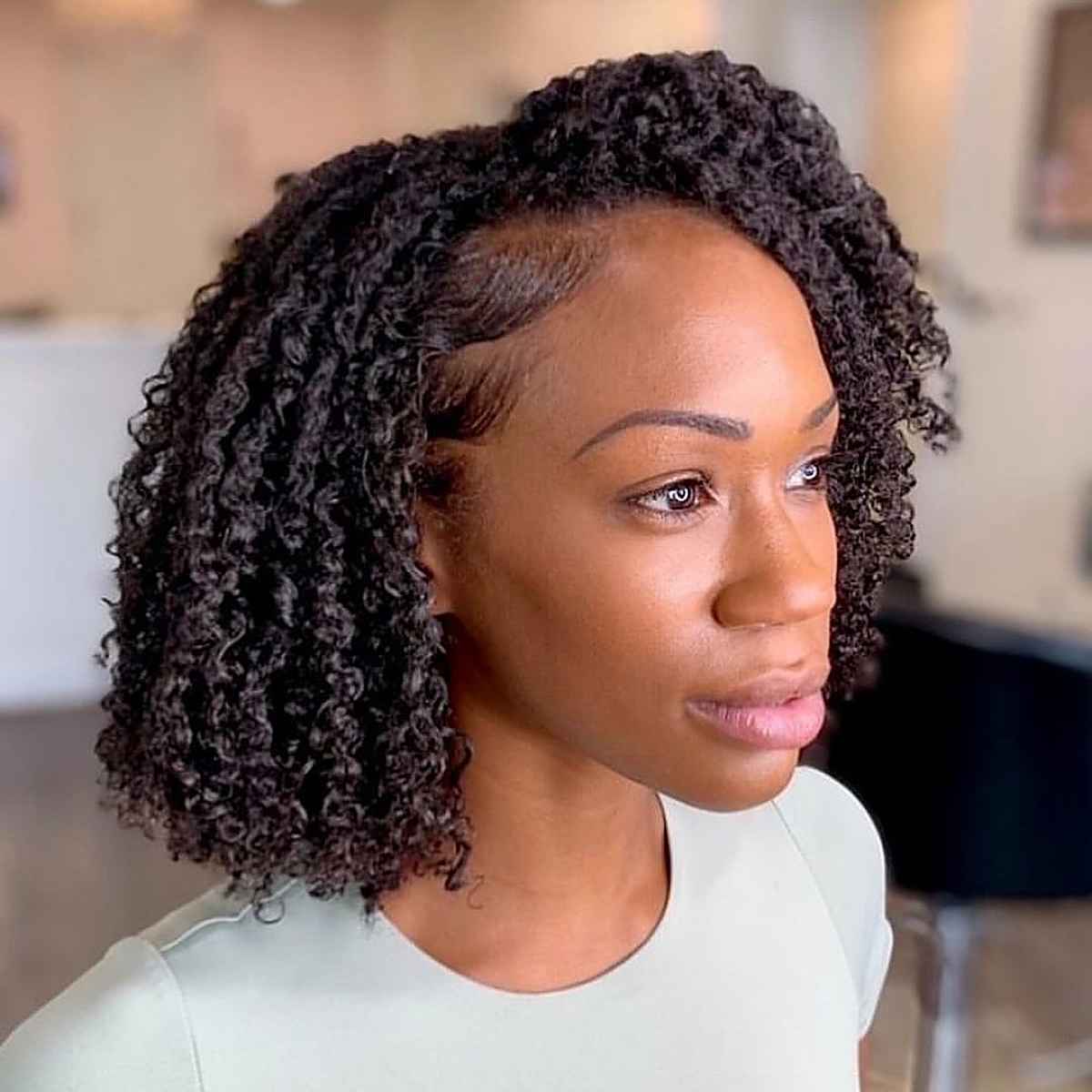 curly bob with spirals and bangs