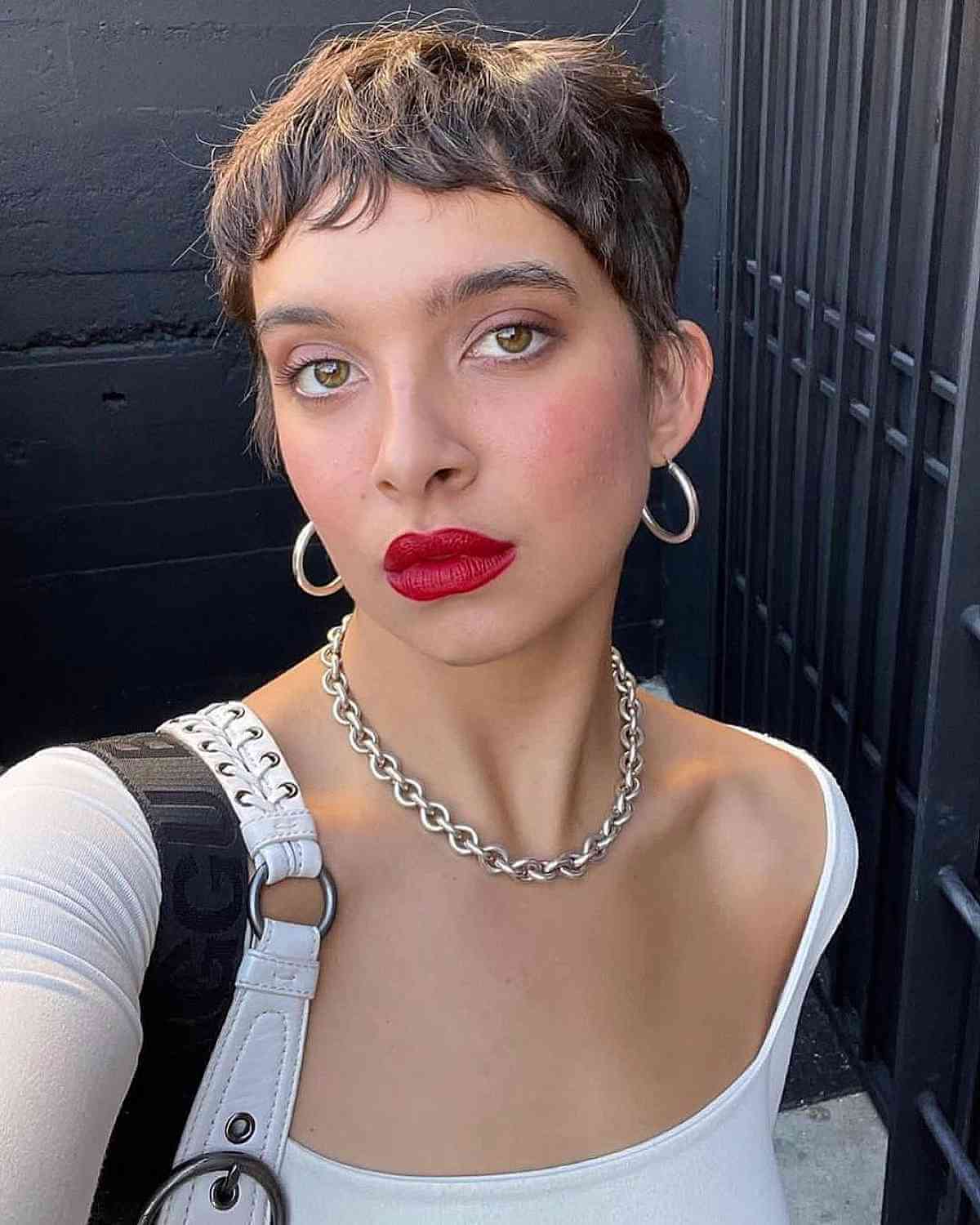 Earthy Pixie Hairstyle with Choppy Bangs