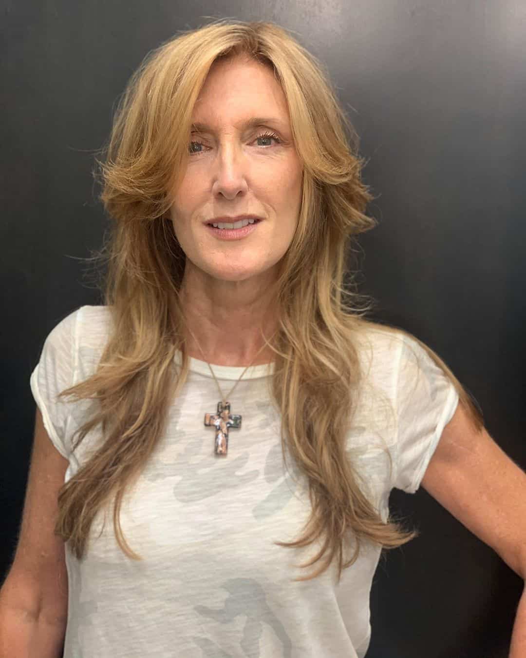 long shag haircut for women in their 50s with thin-hair