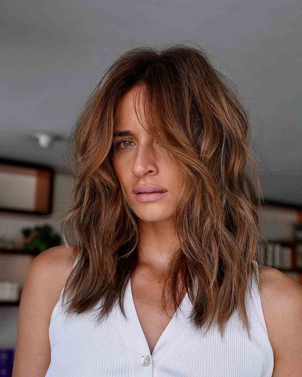 Medium-Length Thick Shaggy Cut with Caramel Brown Tones