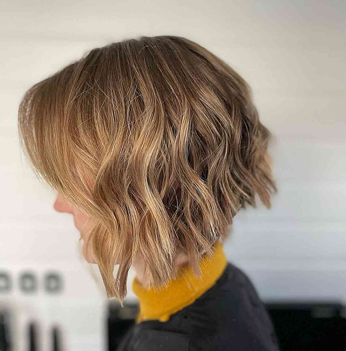 Short Sassy Angled Bob Cut with Choppy Layers