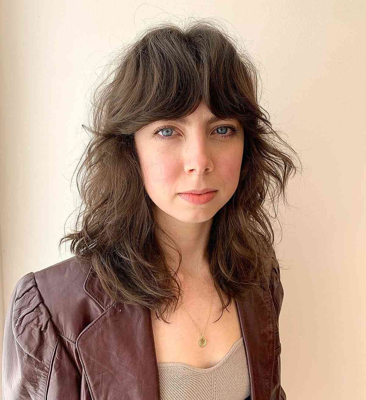 Summer Razored Shaggy Cut with Heavy Curtain Bangs